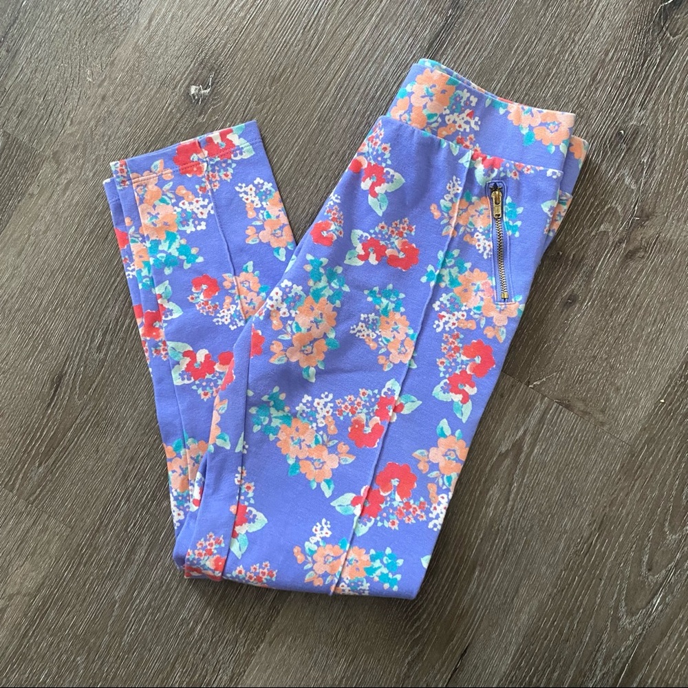 Cherokee ponte floral print pants w decorative zip pockets